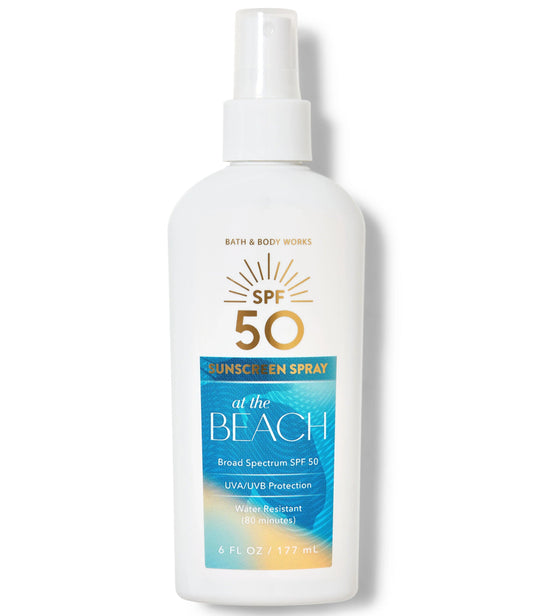 SPRAY PROTECTOR SOLAR AT THE BEACH